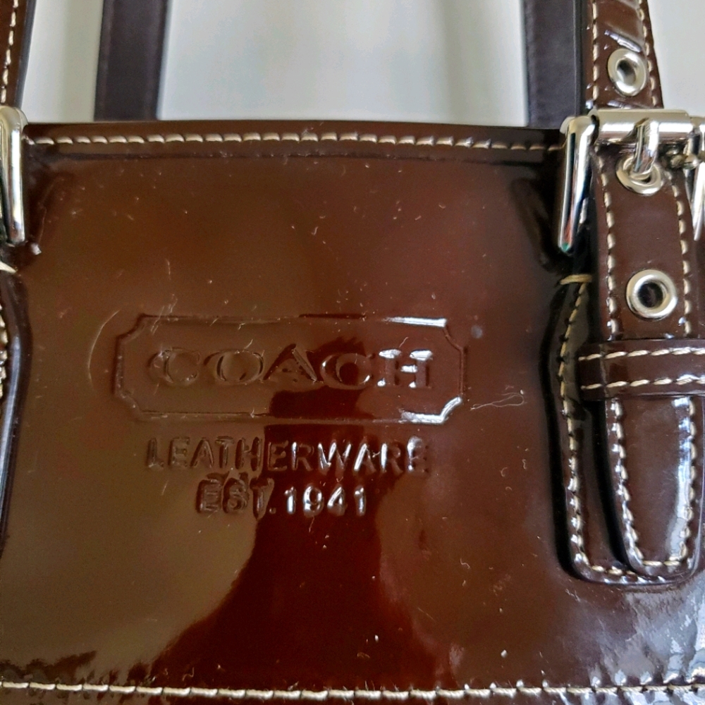 Brown coach patent leather handbag